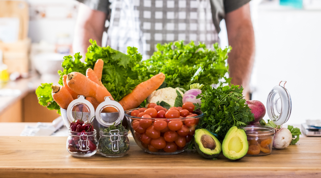 countertop with array of vegetables