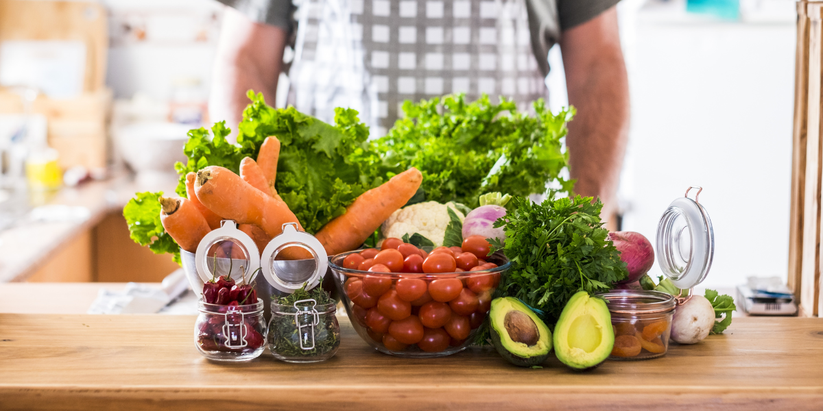 countertop with array of vegetables